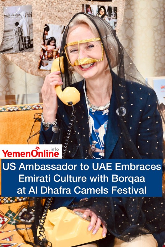 US Ambassador to UAE Embraces Emirati Culture with Borqaa at Al Dhafra Camel Beauty Queen Festival